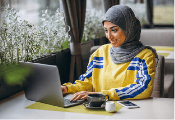 arabian-woman-hijab-inside-cafe-working-laptop